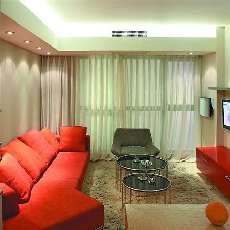 Seasons Park Apart Hotel Pekín Habitación foto